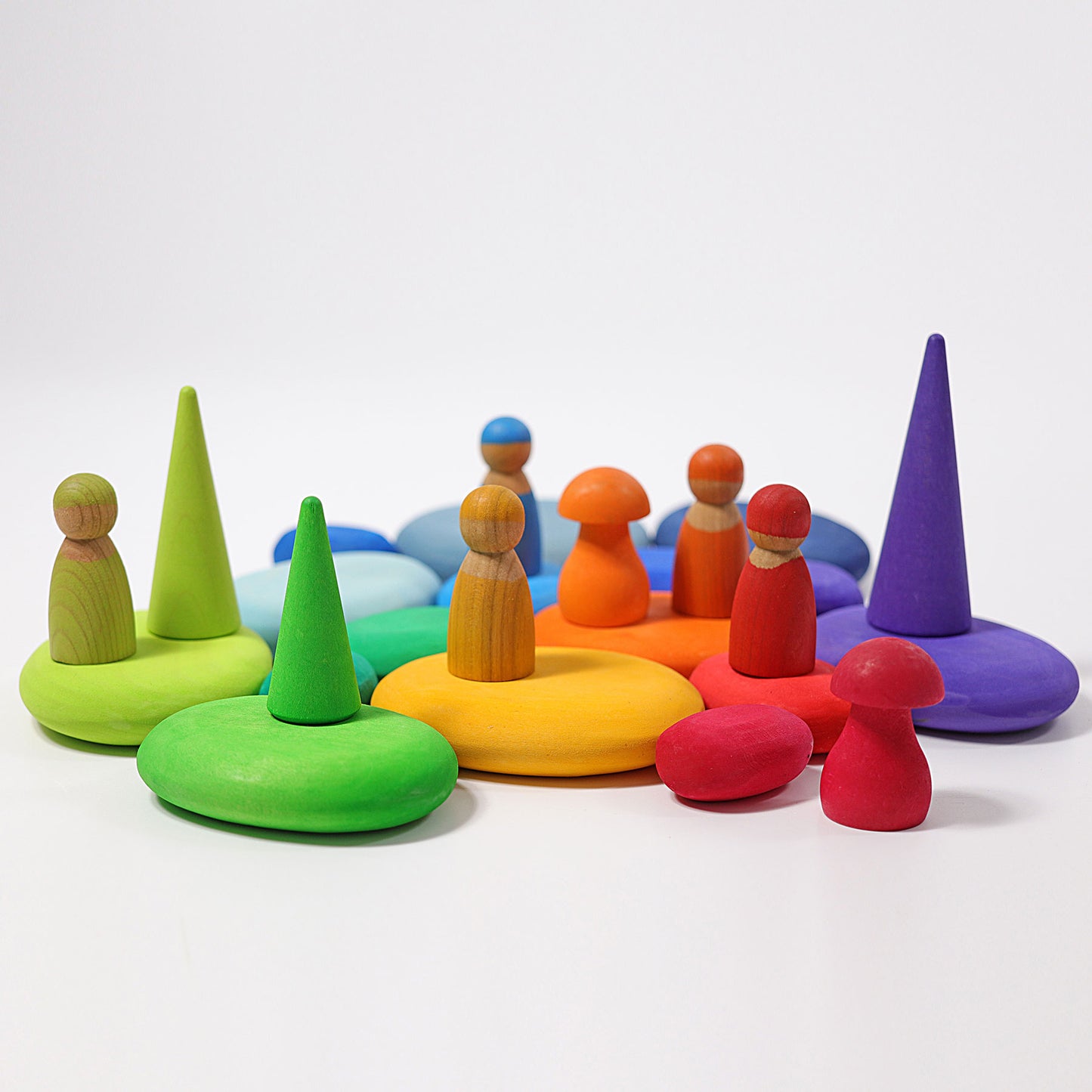 Colorful wooden toys on a white background