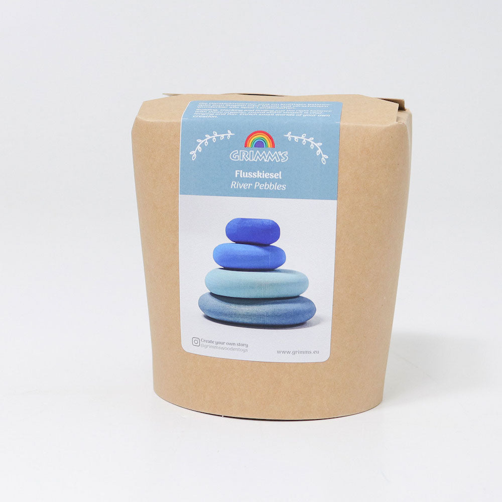 Cardboard packaging with a label featuring blue stones and a rainbow logo on a white background