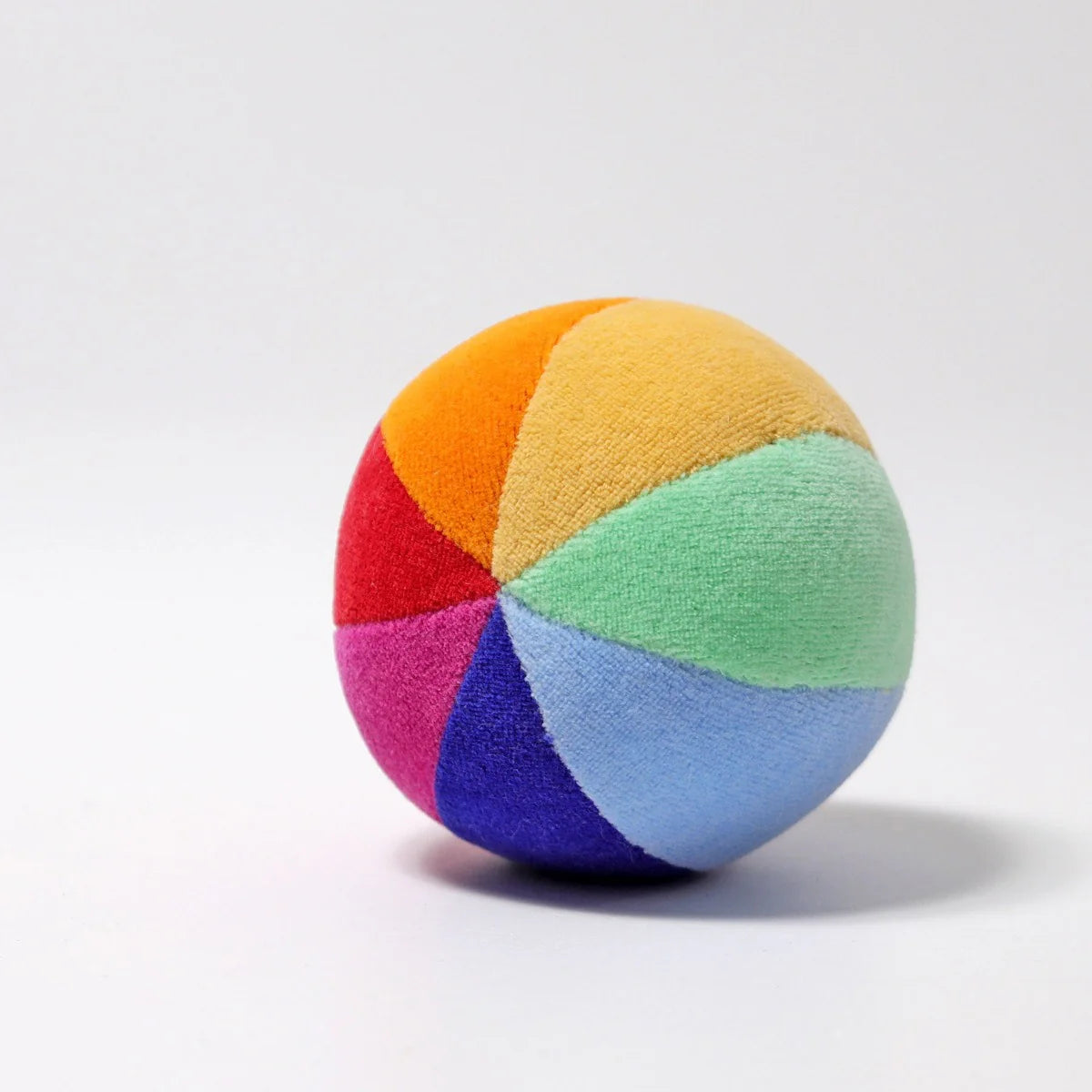 Multicolored ball with rainbow pattern on a white background