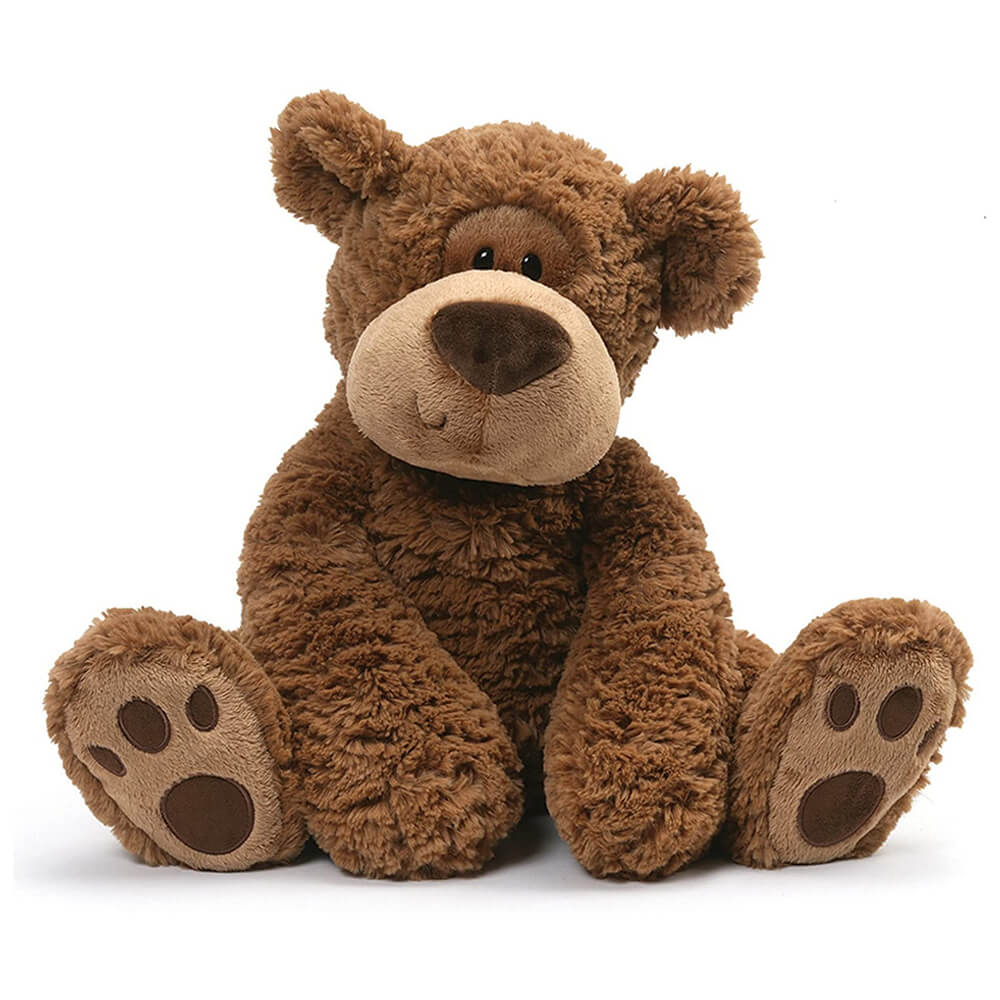 Brown teddy bear on a white background