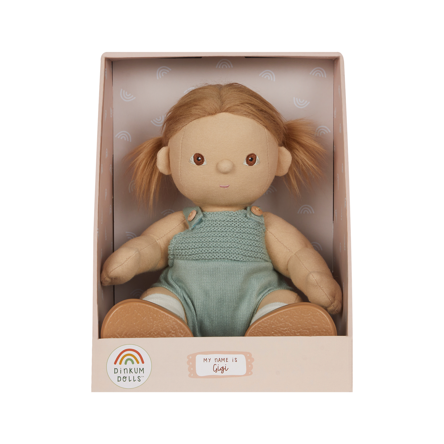 Doll in a box with 'Dinkum Dolls' branding on a white background
