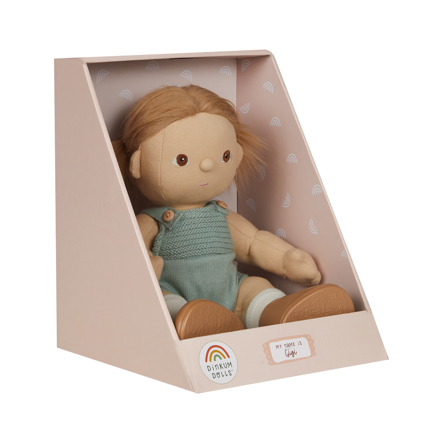 Toy doll in a box with a soft pink interior