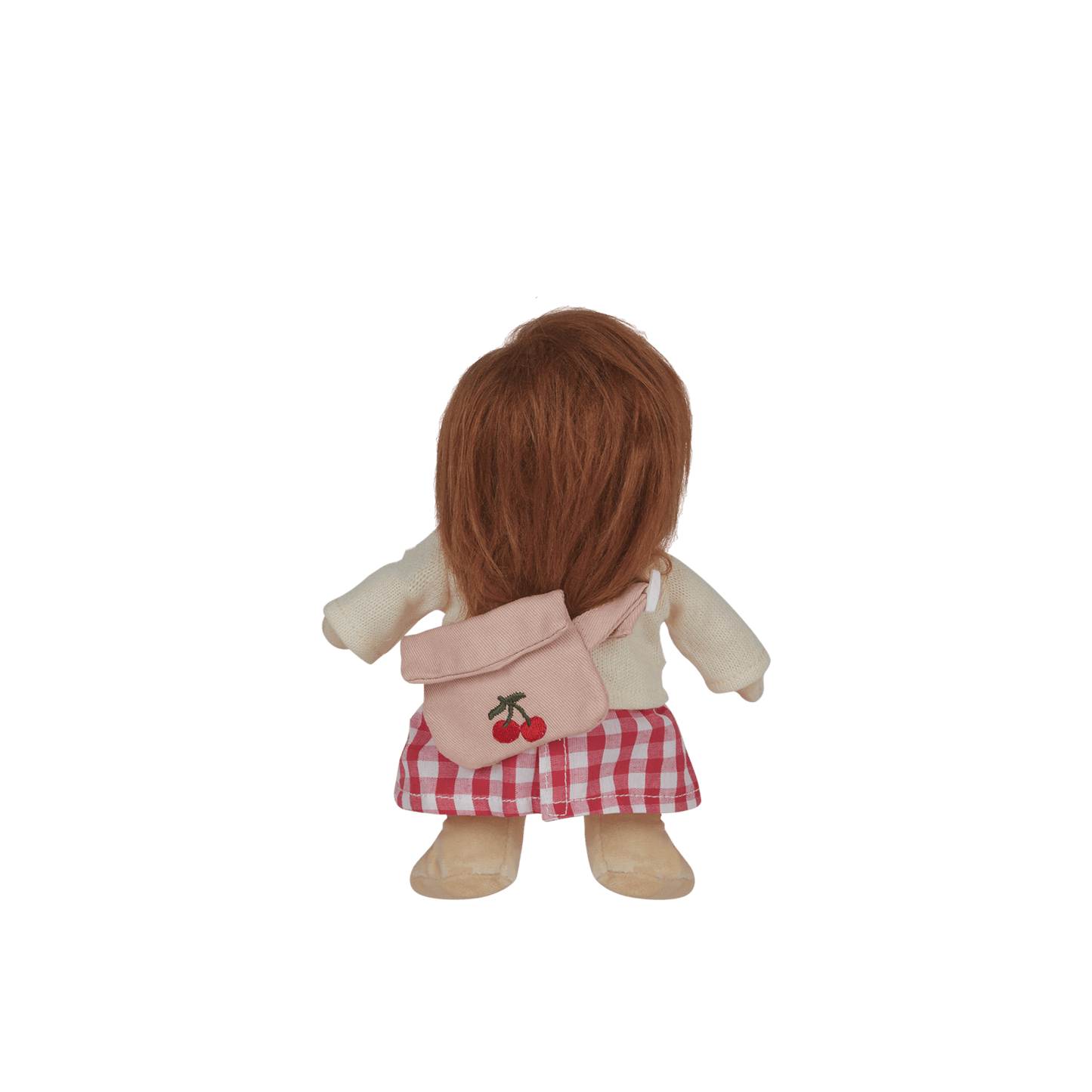 Stuffed toy with a pink backpack featuring cherry designs on a white background