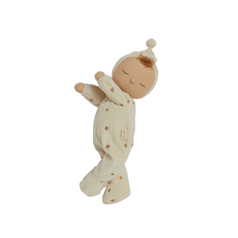 Stuffed baby toy with a white blanket and star pattern on a white background