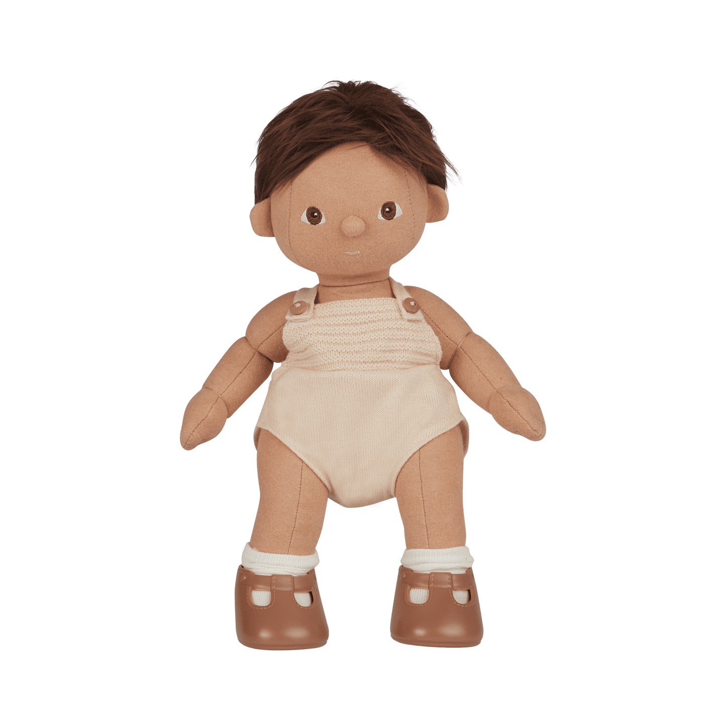 Toy doll with brown hair, beige romper, and brown shoes on a transparent background