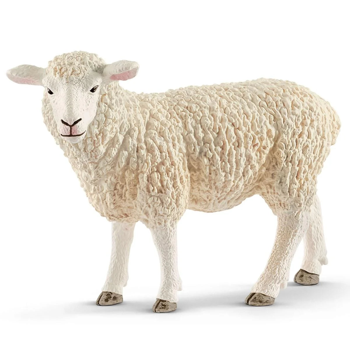 White sheep figurine on a white background