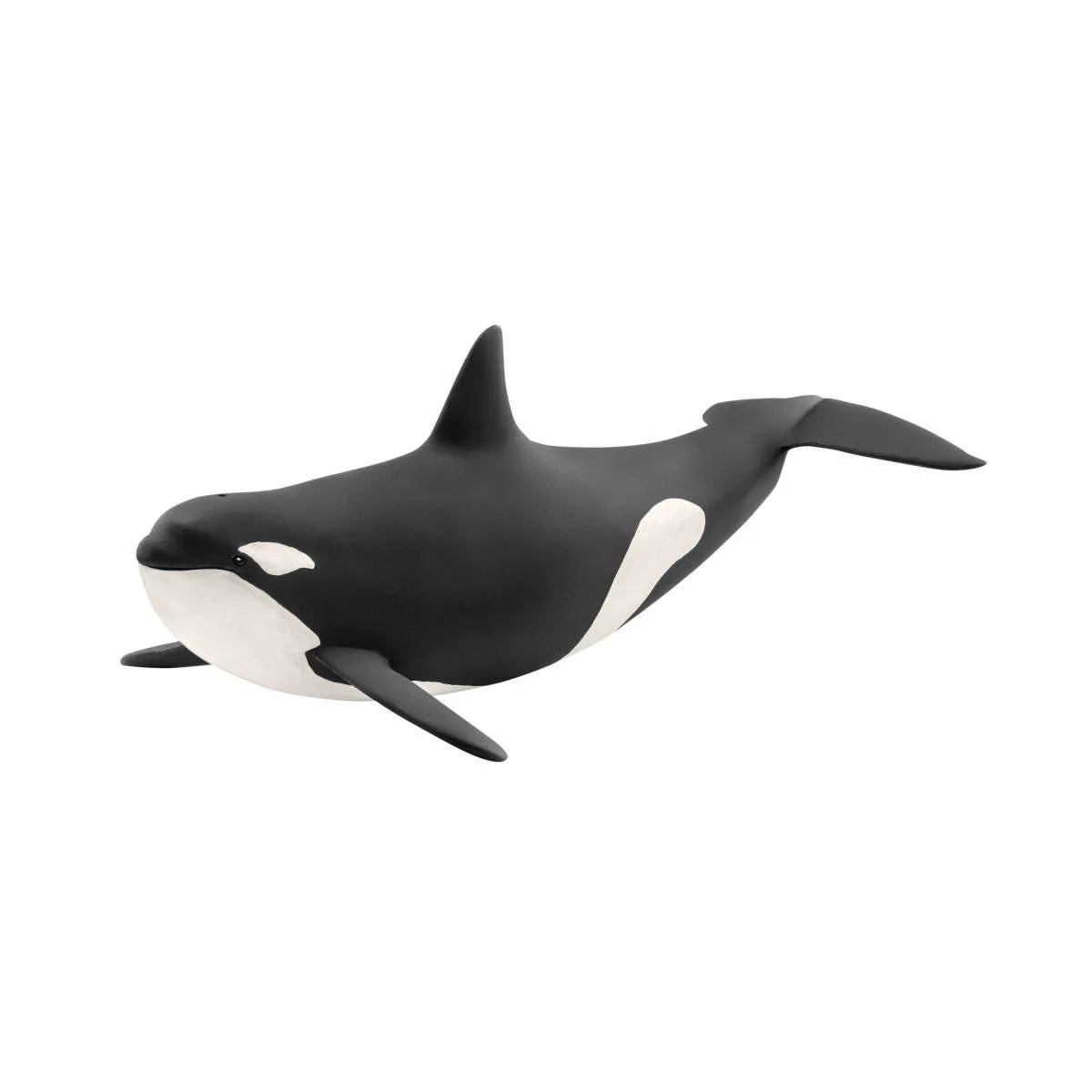 Black and white orca whale toy figure on a white background