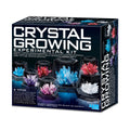 A Crystal Growing Kit box featuring images of crystals in various stages of growth, with the kit's contents displayed on the front.
