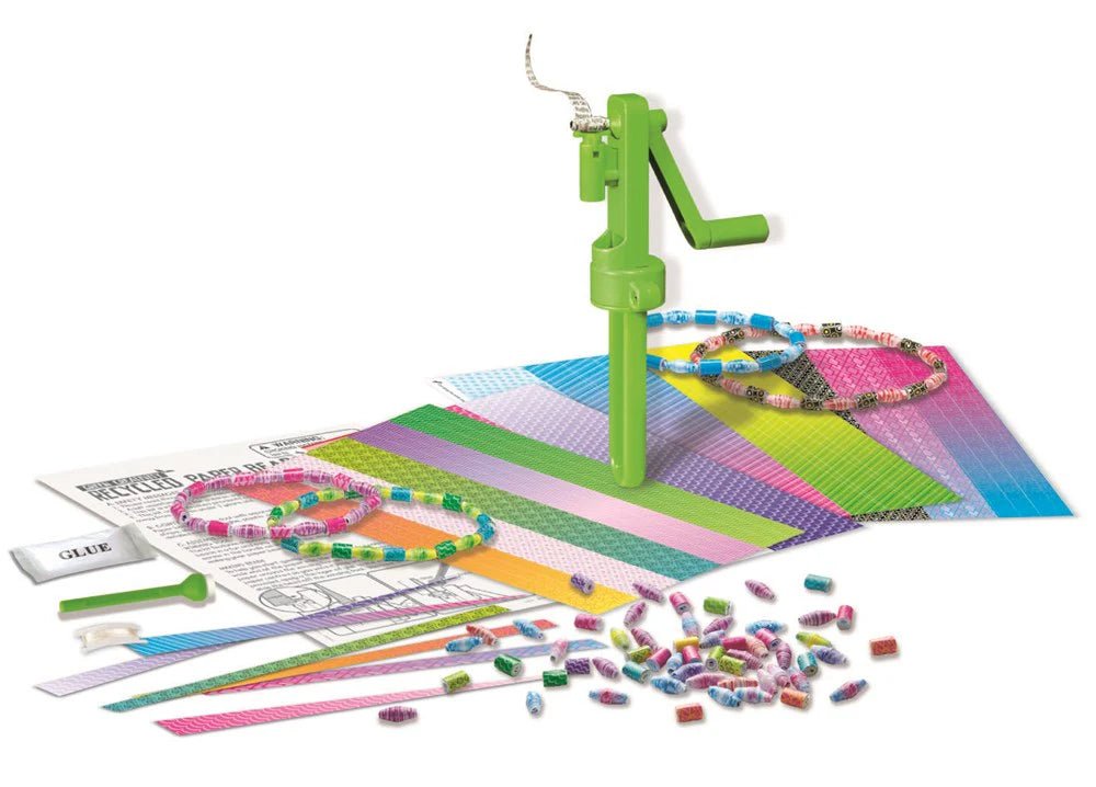 Children's jewelry-making kit with beads, tool, and paper on a white background