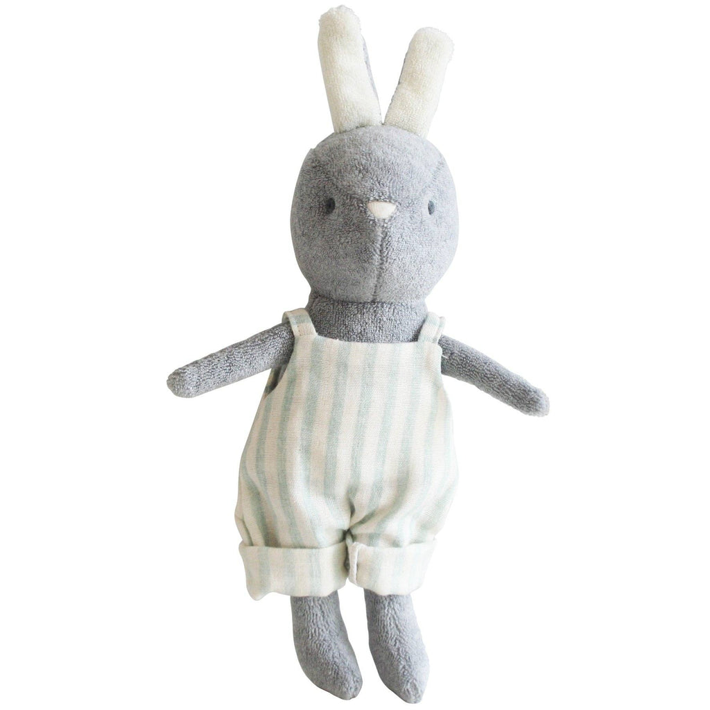 A plush toy bunny with a gray head and body, and a sage green striped overal. The bunny has a tail and two ears, and is depicted in a standing position.