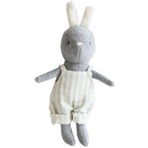 A plush toy bunny with a gray head and body, and a sage green striped overal. The bunny has a tail and two ears, and is depicted in a standing position.