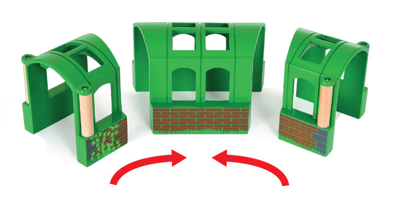 Set of green plastic building blocks with red arrows indicating assembly steps on a white background