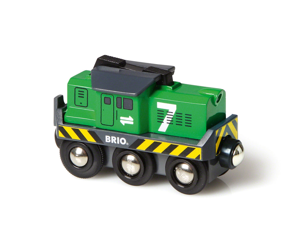 Green toy train engine with number 7 and BRIO logo on a white background
