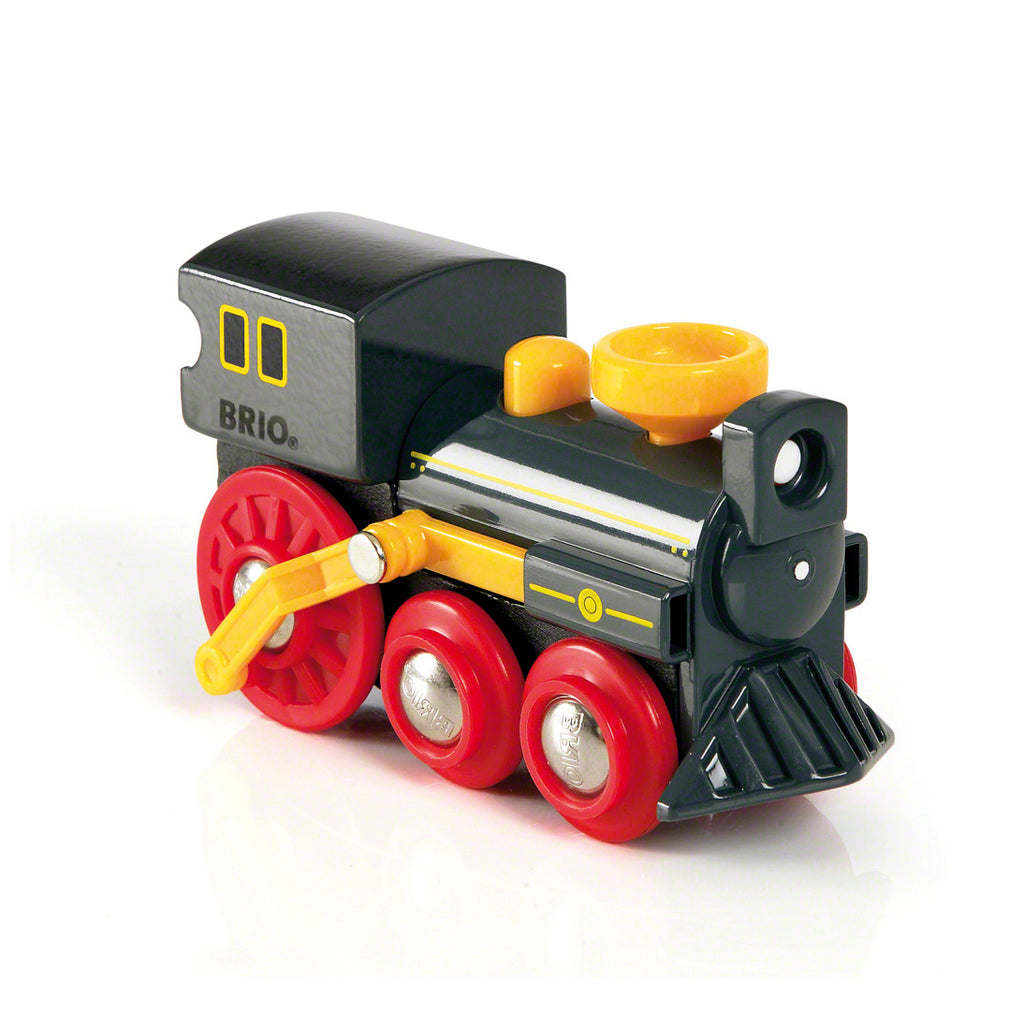 Toy train engine with red wheels and yellow accents on a white background