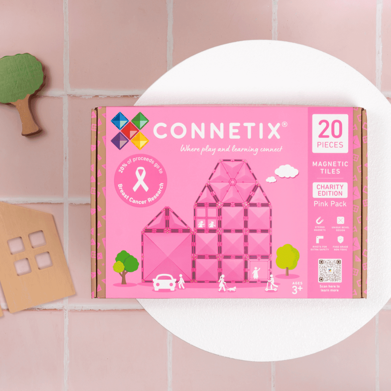 CONNETIX pink charity edition magnetic tiles packaging on a pink tiled background
