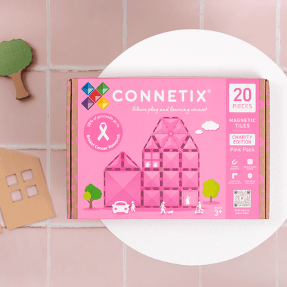 CONNETIX pink charity edition magnetic tiles packaging on a pink tiled background