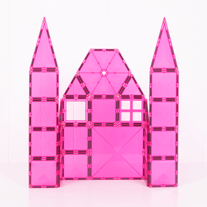 Pink toy castle with two tall towers on a white background
