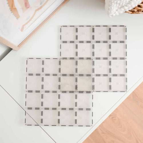 Rectangular woven placemat on a light wooden surface