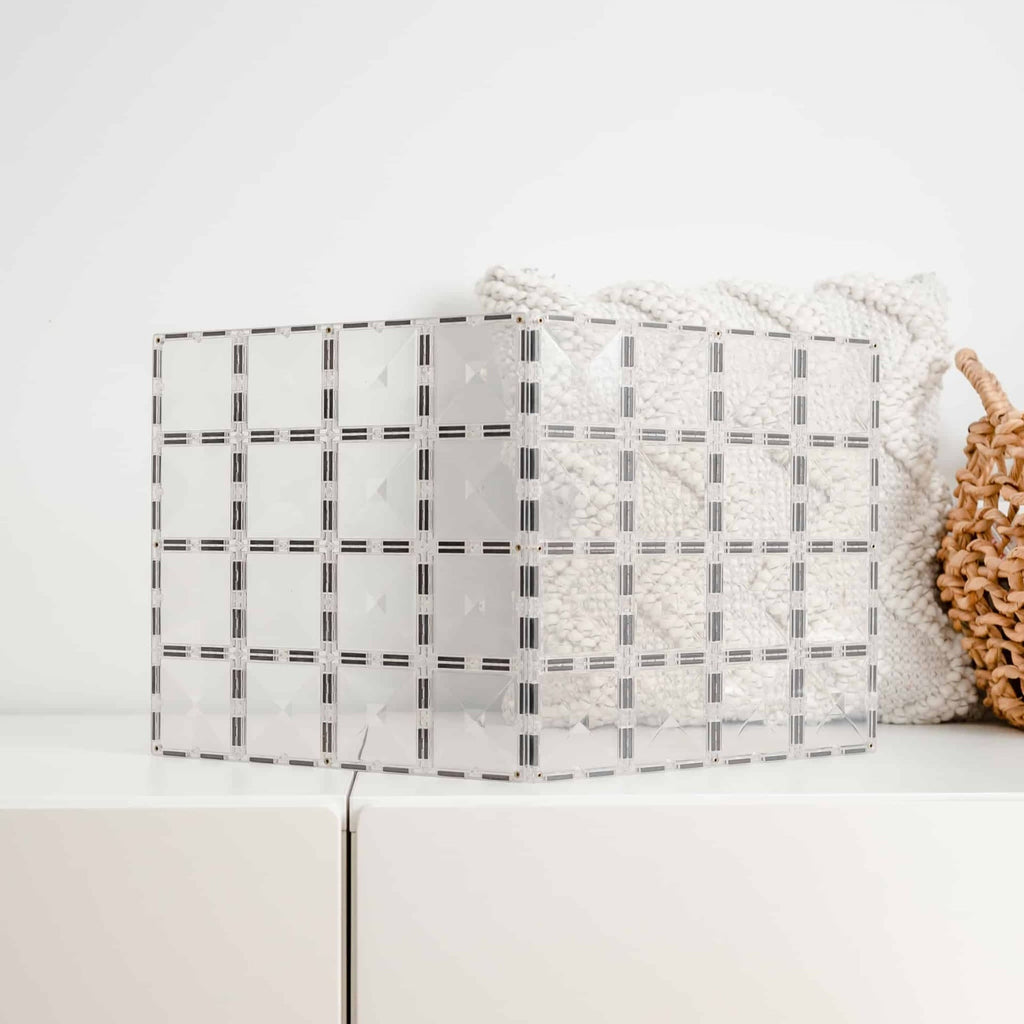 Connetix base plates on a white surface