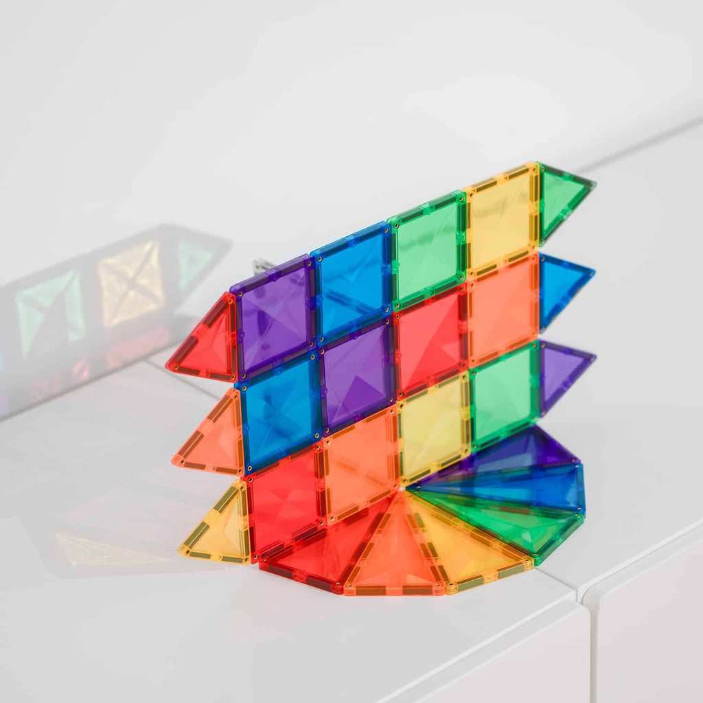 Colorful geometric puzzle on a white surface