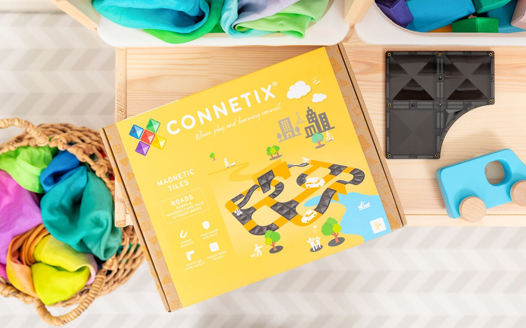 CONNECTIX magnetic toy set with colorful pieces on a wooden surface