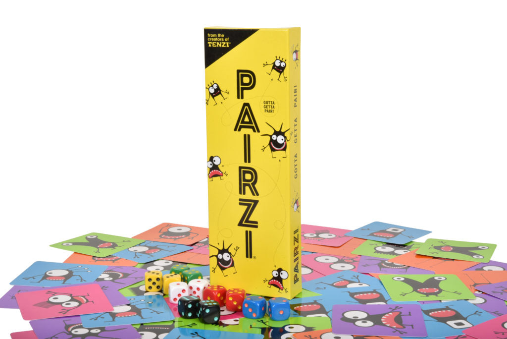Pairzi board game box with dice and cards on a white background