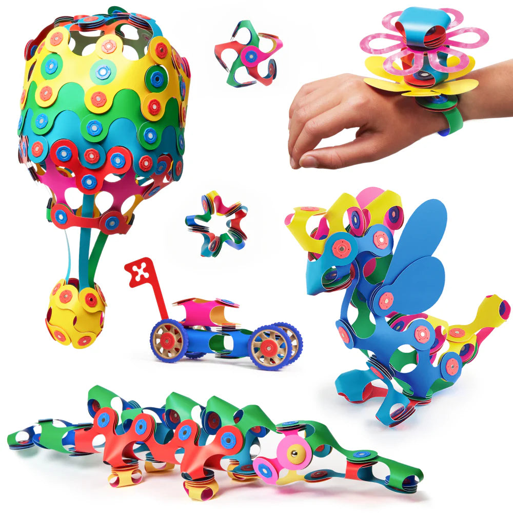 Colorful mechanical models and toys on a white background