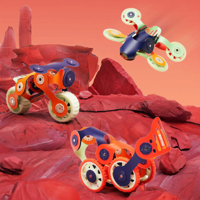 Toy vehicles on a red rocky landscape