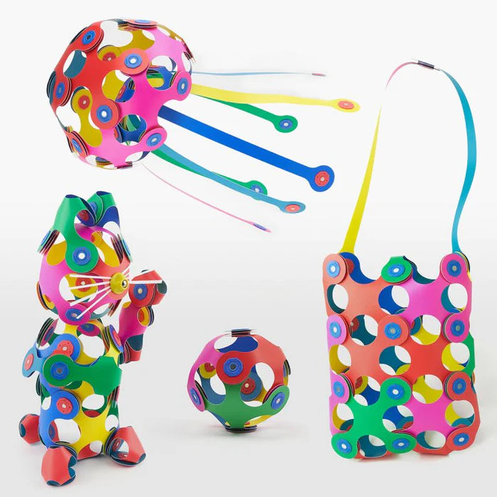 Colorful geometric toy set on a white background