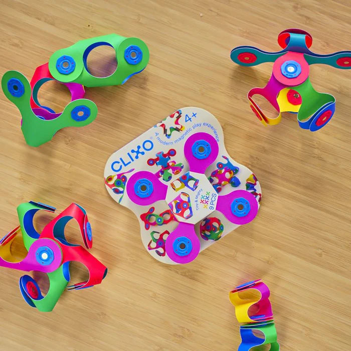 Colorful toy with 'Clixo' branding on a wooden surface