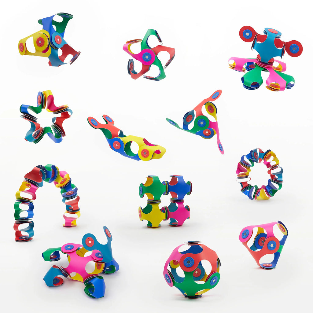 Colorful geometric toys on a white background