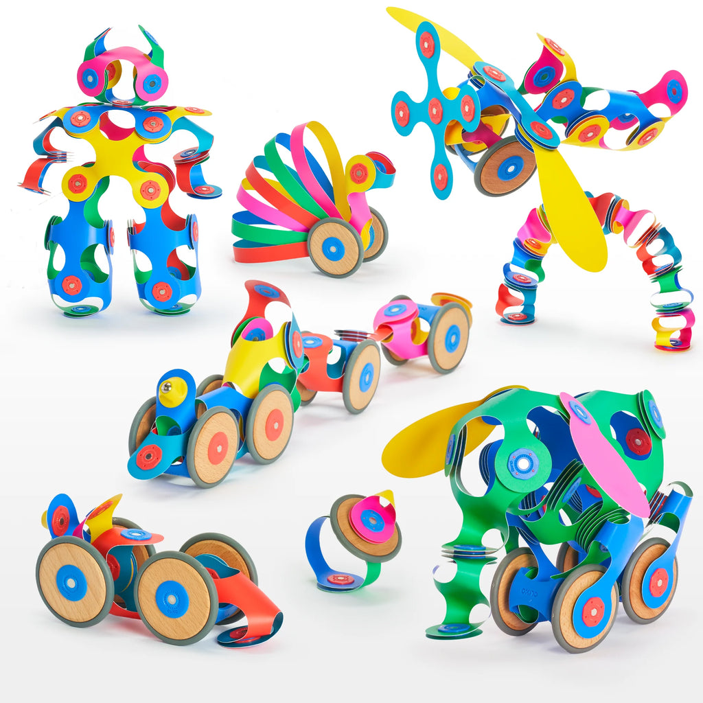 Colorful toy vehicles and robots made from interlocking pieces on a white background
