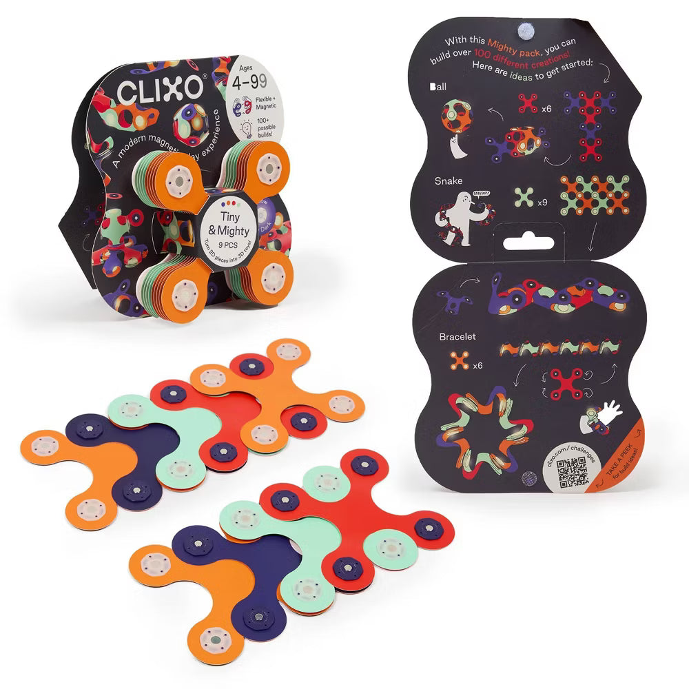 Colorful magnetic building toys with packaging on a white background