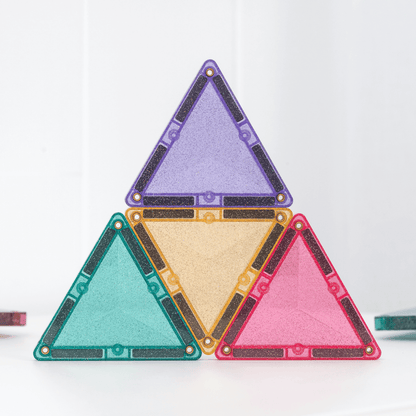 Four triangular tiles in purple, green, gold, and pink on a white background
