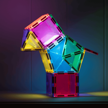 Colorful magnetic building blocks stacked against a dark background