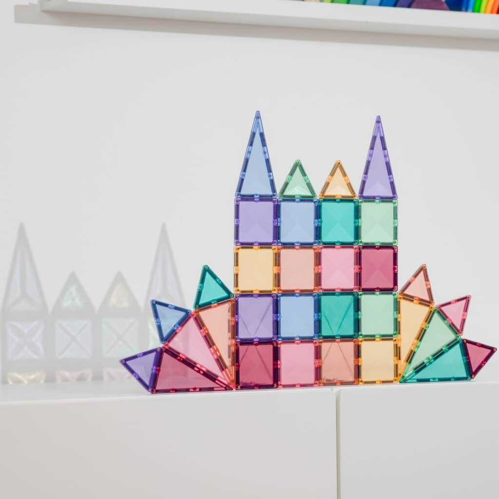 Colorful geometric castle model on a white background
