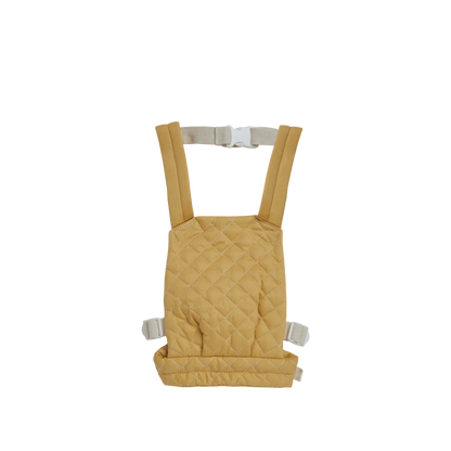 Yellow baby carrier with straps on a white background