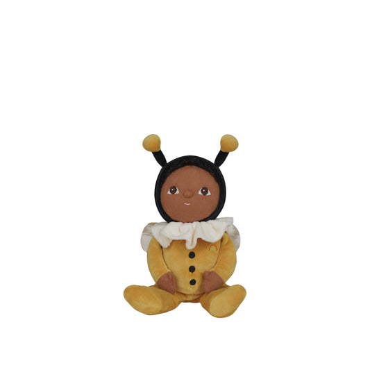 Toy figure of a child in a bee costume on a white background