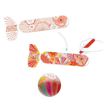 Colorful fish-shaped objects with decorative patterns on a white background