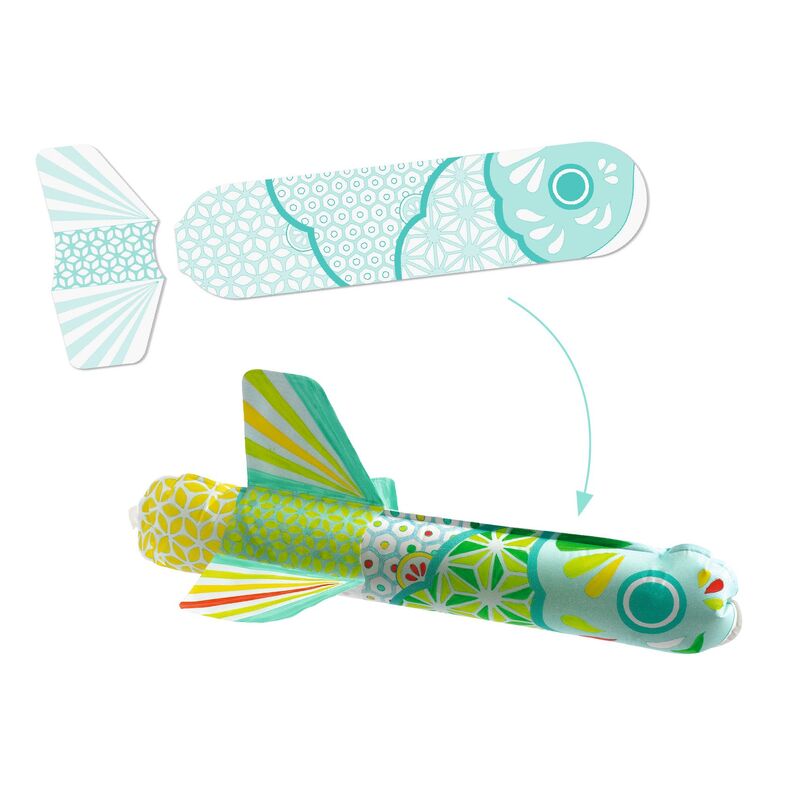 Colorful toy airplane with patterned wings on a white background