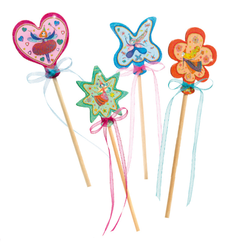 Four colourful magic wands with images of fairies on a white background.