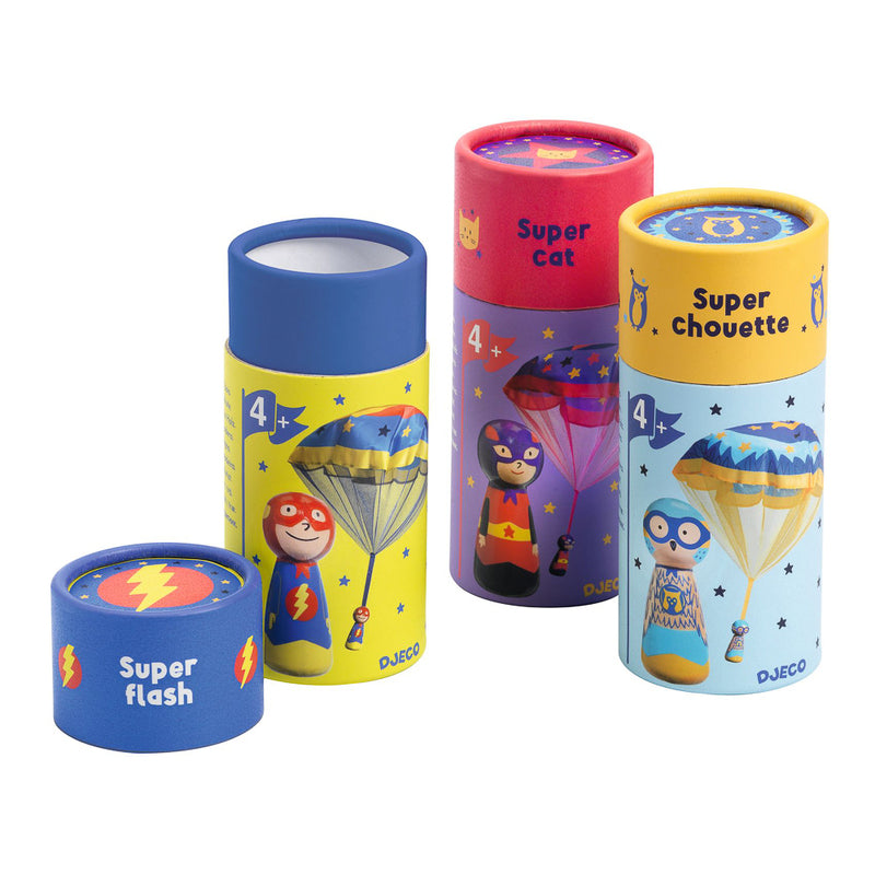 Set of colorful cylindrical toy containers with superhero designs on a white background