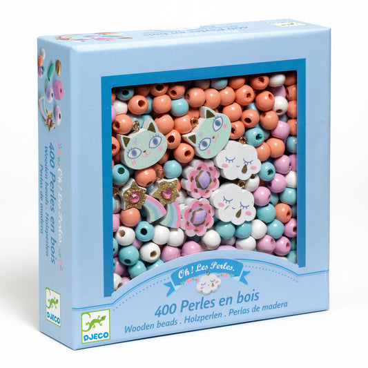 Box of wooden beads with colorful designs on a white background
