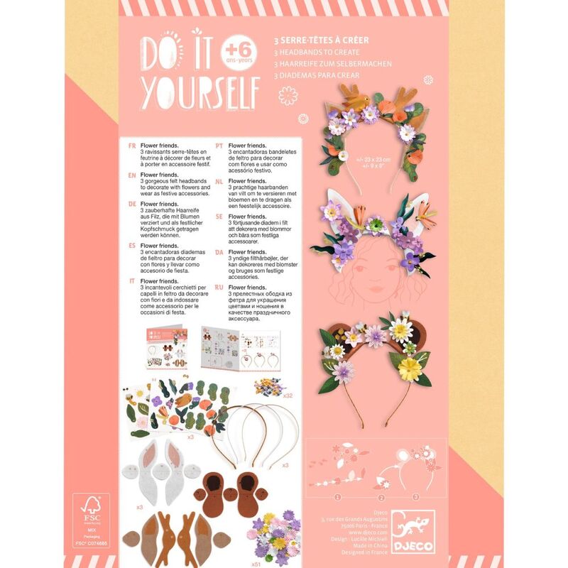 Floral headband craft kit with instructions and materials on a pink background