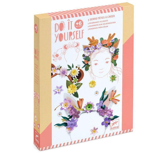 Box for a 'Do It Yourself' craft kit with floral designs and a girl's face on a white background.