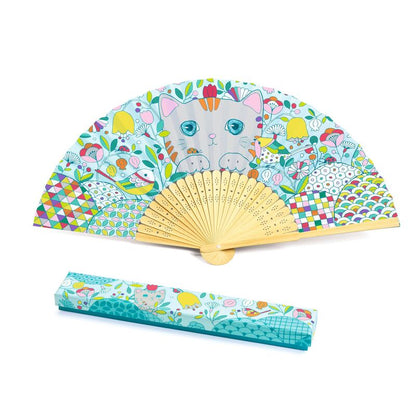 Colorful hand fan with cat design and matching case on a white background