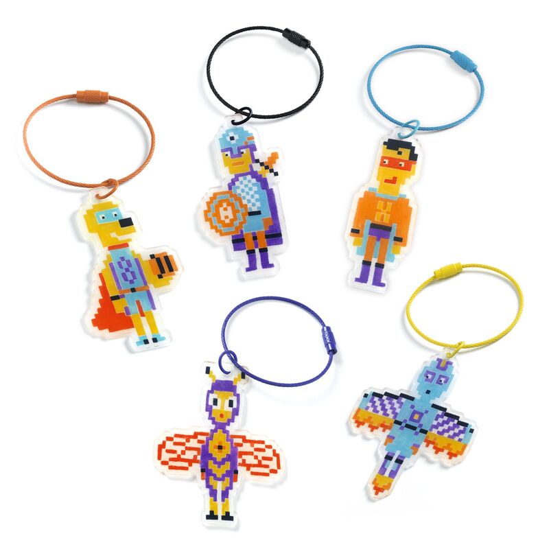 Set of colorful pixelated character keychains on white background