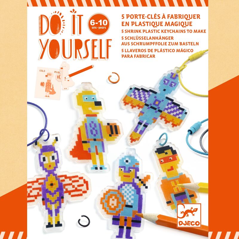 Packaging of a DIY shrink plastic keychain kit with colorful characters on an orange background.