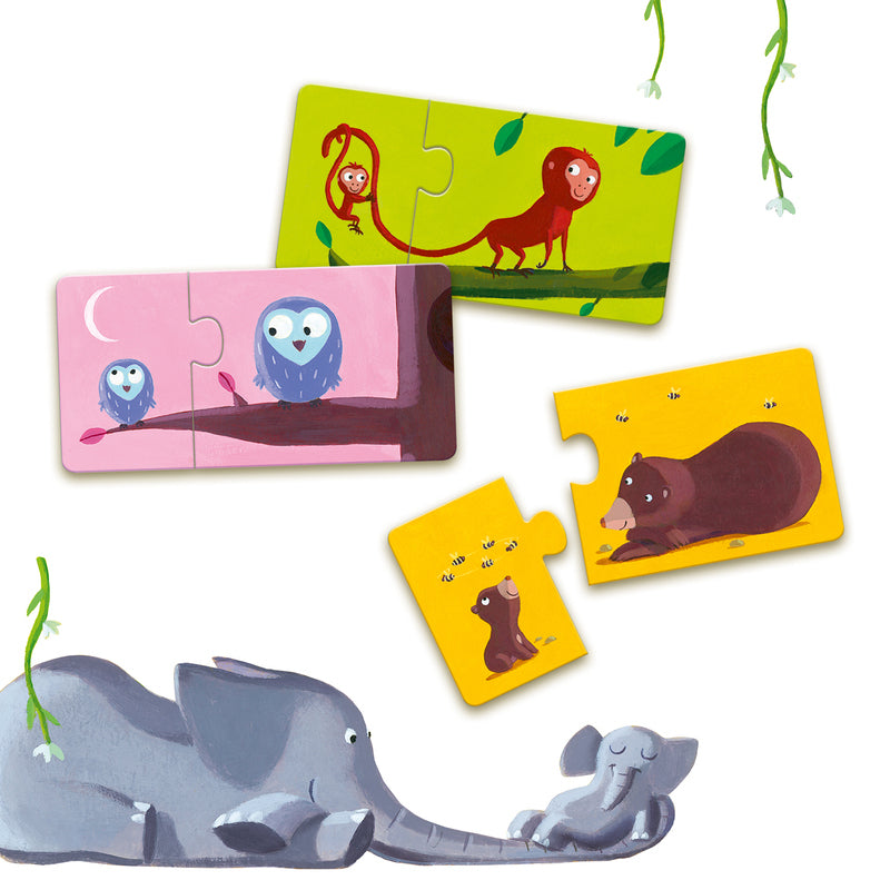 Set of children's animal puzzles with a large elephant toy in the foreground.