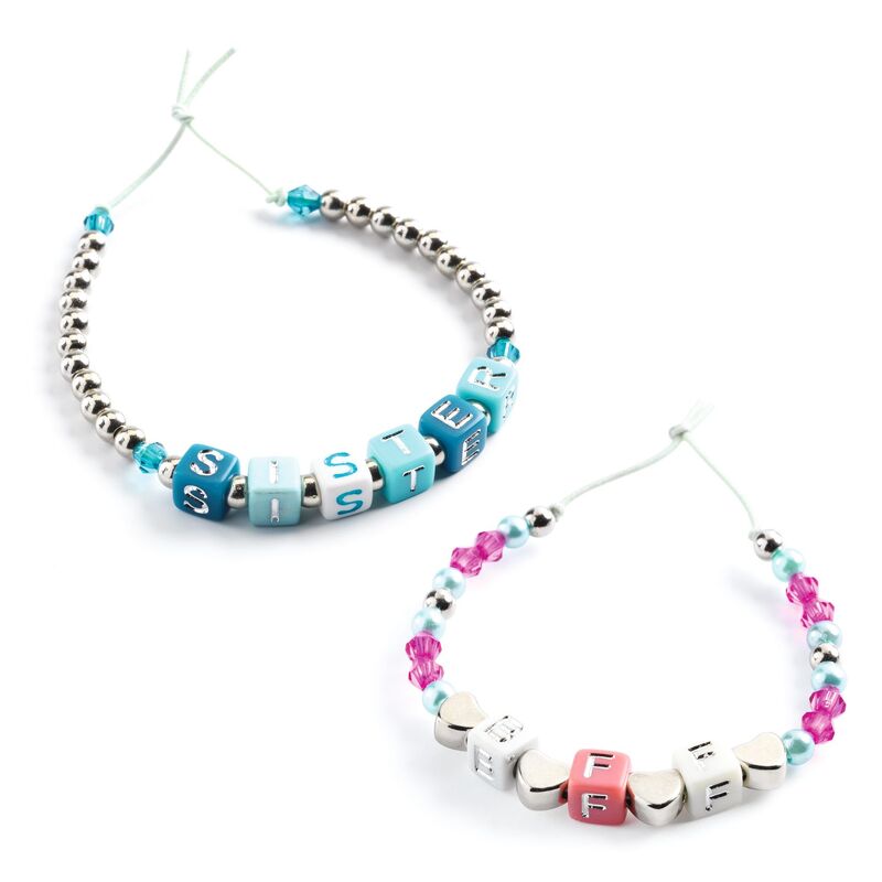 Two beaded necklaces with letter beads spelling out 'SISTERS' on a white background.